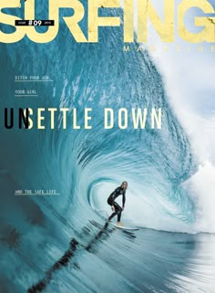 a man riding a wave on top of a surfboard in front of a blue ocean