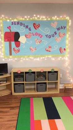 a playroom with lots of toys and lights on the wall, including an area rug