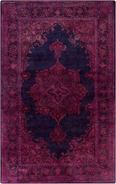 a purple and red rug with an ornate design