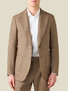 Crafted in Northern Italy from 100% pure linen, treated to obtain a unique natural stretch for breathability and comfort. Designed with a single-breasted 2-button closure, fine sartorial details and a tailored profile for an elegant look.     Cut in a slim yet comfortable fit, this elegant suit jacket has an unstructured profile and is half lined for lightness and a relaxed appeal. Artisanal details like AMF stitching and sartorial details like the notch lapel and patch pockets make this blazer Timeless Linen Blazer With Lapel Collar, Timeless Linen Blazer For Business, Classic Linen Blazer With Pockets, Business Casual Linen Blazer With Concealed Placket, Linen Blazer For Business Casual, Luxury Single Breasted Linen Blazer, Luxury Linen Single Breasted Blazer, Timeless Beige Linen Suit, Classic Linen Blazer For Office