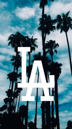 the los angeles dodgers logo is surrounded by palm trees