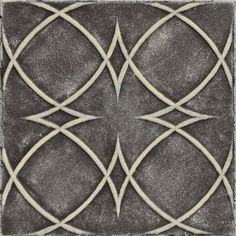 an artistic tile design in grey and white with intersecting lines on the bottom half of it