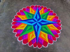 a colorful flower is painted on the ground