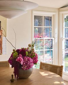 Our woven dining room chairs complement this elegant dining room space by adding texture and blending in to the neutral color palette. Credit: @anrynakedinteriors Photography: @tinamichellephoto