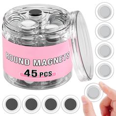 the round magnets are in a clear jar