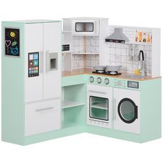 a dollhouse kitchen with green cabinets and white appliances, including a stove top oven