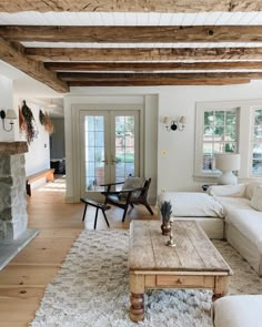 a living room filled with furniture and a fire place