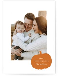 a happy thanksgiving card with an orange pumpkin on the front and a photo of a man holding