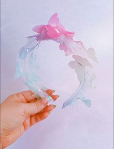 A white Tulle headband in turban knot style with variations of rainbow butterflies. Butterflies are in various sizes throughout the headband in pink, peach, yellow, mint, and purple. Underneath the mesh is a hard headband for structure in clear. These headbands fit toddlers, kids and adults. Exact color placement of butterflies will vary and be unique to each headband!  Handmade with love and magic in Southern California. Tulle Headband, Butterfly Rainbow, Spring Headband, Headband Handmade, Rainbow Butterflies, Easter Wedding, Headband Crown, Hard Headbands, Tulle Bows