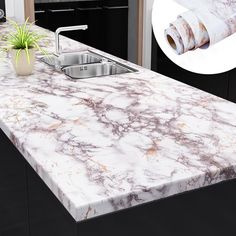 an image of a kitchen counter top that looks like marble