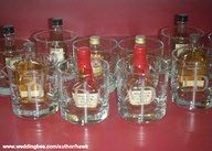 several bottles of liquor lined up on a counter