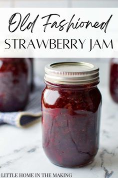 an old fashioned strawberry jam in a mason jar with the words, old fashioned strawberry jam