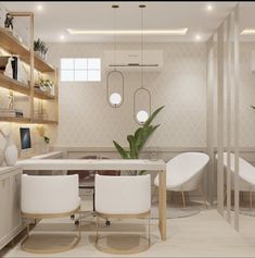 a dining room with white chairs and a table surrounded by shelves on either side of the room