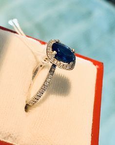 Stunning 18k White Gold Natural Sapphire Diamond Ring: Natural Sapphire: 1.73 CT Side Diamonds: 0.29CT Color: G-I Clarity: VS2 Total ring weight: 3.2GR 18K White Gold Ring sizing available free of charge For more information regarding this item feel free to reach me so I can accommodate your needs. Thank you Luxury Round Halo Ring, Gia Certified Diamond Halo Ring For Formal Occasions, Fine Jewelry Halo Ring With Center Stone For Proposal, Timeless Gia Certified Halo Ring As Gift, Formal Gia Certified Diamond Halo Ring, Fine Jewelry Halo Ring For Proposal, Cluster Sapphire Diamond Ring With Halo Setting, Sapphire Diamond Cluster Ring With Halo Setting, Gia Certified Diamond Cluster Halo Ring