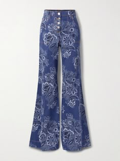 Etro's jeans really capture the brand's signature bohemian aesthetic - they're printed with an array of flowers that incorporate the house's signature paisleys. Cut denim with a touch of stretch for flexibility, they sit high on the waist and have '70s-inspired flared legs. Jean Trench Coat, Stretches For Flexibility, All Over Pattern, Sports Trousers, Blazer Shirt, Floral Denim, Flared Jeans, White Denim, Wide Leg Trousers