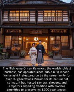 two people standing in front of a building with japanese writing on the door and windows