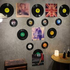 a wall with various records on it