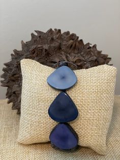 Handmade in Ecuador Material: Tagua Nut Stretchable Bracelet Due to this item being handmade and the nature of the Tagua Nut the size and the color may vary from piece to piece Nut Bracelet, Tagua Nuts, Jade Jewelry, The Nature, Ecuador, Shades Of Blue, Shades, Throw Pillows, Bracelet