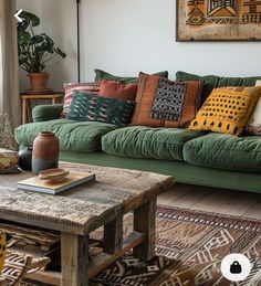 a living room filled with lots of green furniture and colorful pillows on top of it