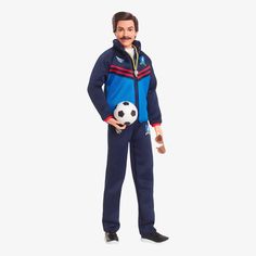 a man with a soccer ball in his hand is wearing a blue suit and black shoes