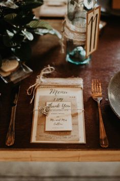 The rustic charm of Kirsty-Lee and Alex’s wedding reception at Yabbaloumba Retreat is reflected in every detail, including the beautifully simple menu. Wrapped in twine and adorned with a wooden heart charm, the menu perfectly complements the greenery and natural elegance of the wedding table. This cozy, heartfelt touch adds to the inviting atmosphere of their unforgettable day. Discover more rustic wedding inspiration at Yabbaloumba Retreat for your special celebration. Rustic Wedding Menu, Simple Menu, Rustic Wedding Inspiration, Wedding Tables