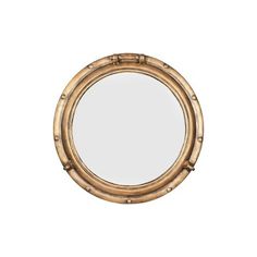 a round mirror on a white background