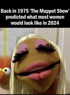 the muppet show's face is shown in front of an image of a woman with