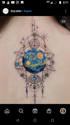 the back of a woman's neck with an artistic tattoo design on her shoulder