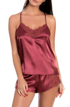 Fall in love completely with this satin cami and matching shorts featuring sheer lace with scalloped edges. 15 1/2" top center front length; 2" inseam, 29" leg opening; 9 1/2" front rise; 13" back rise (size Medium) Cami has V-neck; adjustable straps; racerback Shorts have elastic waist 100% polyester with 64% nylon, 19% spandex, 17% rayon lace Machine wash, tumble dry Imported Lingerie Satin Shorts For Women, Fancy Pajamas Satin, Victoria Secret Satin Short Pj Set, Satin Pajamas Shorts, V-neck Lace Trim Camisole For Pajama Party, Lace Camisole For Pajama Party, In Bloom By Jonquil, Silk Pjs, Sleep Sets