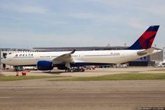 an airplane is parked at the airport terminal