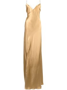 Gold-tone silk satin strappy wrap gown from Michelle Mason featuring spaghetti straps, a V-neck, an open back, a side tie fastening, a flared skirt, a front slit and a long length. Gold Silk Dress, Women Silk Dress, Silk Prom Dress, Gown Gold, Bridal Party Outfit, Michelle Mason, Silk Dress Long, Flared Skirt, Outfit Summer