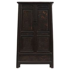 an old wooden cabinet with two doors