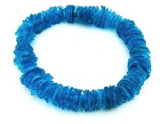 a blue bracelet is shown on a white background