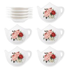 six white dishes with pink roses on them