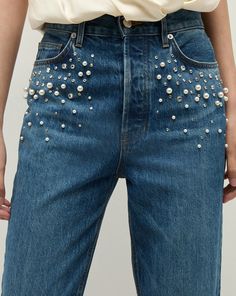 The Daniela you know and love—now with pearl and rhinestone embellishments. Made in LA from premium Italian denim, the high-rise, straight-leg jean features a snatched waist, a smooth, flat stomach and an ankle crop. The versatile length works well with flats and heels alike.Part of our capsule collection in collaboration with model, actress and entrepreneur Poppy Delevingne.100% CottonMade in USA from premium Italian denimTurn inside out and machine wash cold. Hang to dry.Style #J24109380079SY Snatched Waist, Designer Jeans For Women, Poppy Delevingne, Kick Flare Jeans, Leather Pant, Classic Jacket, Embellished Jeans, Rhinestone Embellishments, Kick Flares