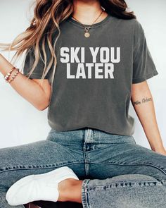 "A Comfort Colors unisex \"SKI YOU LATER\" garment-dyed t-shirt made 100% with ring-spun cotton.  Ski Club Shirt, Ski Lodge, Winter Sports TShirt, Ski Tee, Ski Lover Gift Idea, Ski You Later TShirt Ski Party Apparel For Women Gift For Her For an Oversized Look order 1 to 2 sizes larger than your normal size. 🌟100% ring-spun cotton 🌟Heavy fabric (6.1 oz/yd² (206.8 g/m 🌟Relaxed fit RETURNS: All products are made-to-order and because of the nature of these items, all sales are final unless they Sporty Crew Neck Top For Ski Season, Casual Skiing Tops, Casual Graphic Print Top For Skiing, Crew Neck Tops For Ski Season, Sporty Crew Neck Skiing Tops, Casual Crew Neck T-shirt For Snowboarding, Sporty Crew Neck Tops For Skiing, Ski Shirt, Ski Party