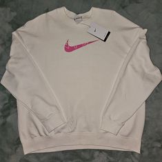 Brand New With Tags Nike Sweatshirt This Is A Size Large And Never Been Worn. Smoke And Pet Free Home. Pink Nike Crewneck, Nike Pink Sweatshirt For Streetwear, Nike Pink Crew Neck Top, Nike Sweatshirts Womens Pink, Pink Crew Neck Sporty Sweatshirt, Nike Sweatshirts, Nike Tops, Pink White, Nike Women