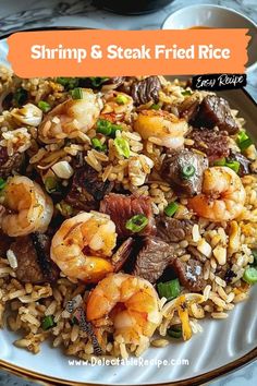 shrimp and steak fried rice on a plate