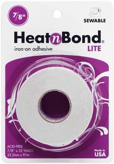 a roll of white adhesivee tape on top of a purple package with the words heat