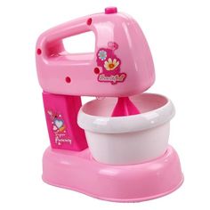 a pink toy mixer sitting on top of a table