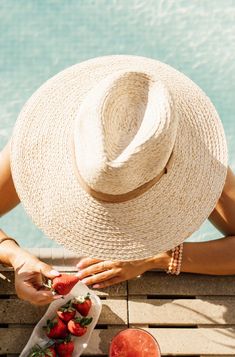 This summer, freshen up your outdoor look with a delightfully woven straw hat, fit with an on-trend flat brim, and topped off with a velvet trim for a hint of sophistication. It's the perfect accessory to bring a fun and fashionable flair to your beach days, pool parties, and picnics. So go ahead, rock the Piña Colada Hat and get ready to make summer memories! Check out when Brittnie paired this gorgeous hat with the Cancun Cabana Dress HERE. MMT8042 Beach Sand And Hat, Fancy Hats Classy Beach, Luxury Summer Beach Cowboy Hat, Luxury Summer Party Sun Hat, Fancy Hats Beach, Luxury Chic Toquilla Straw Hat, Luxury Fitted Mini Hat For Beach, Summer Party Felt Hat, Beach Day Accessories