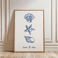 an art print with the words sun and sea in blue ink on a white background