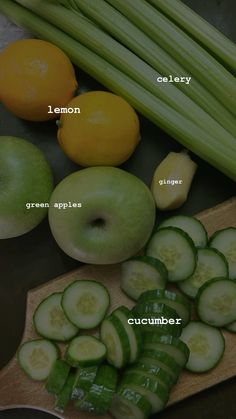 an assortment of vegetables including celery, lemons, and cucumbers