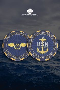 two blue and yellow usn emblems in the ocean with dark clouds above them