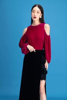 Indulge in luxury with our top. The smooth velvet fabric and chic cold shoulder design exude sophistication while keeping you comfortable. Make a statement and elevate your wardrobe with this exclusive piece. Chic Long Sleeve Velvet Blouse, Elegant Velvet Blouse For Fall, Elegant Long Sleeve Velvet Blouse, Elegant Long Sleeve Velvet Tops, Velvet Blouse For Party, Fall Party Blouse With Cold Shoulder, Fall Party Cold Shoulder Blouse, Elegant Velvet Tops For Fall, Chic Velvet Tops For Fall