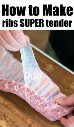 a person cutting up a piece of meat on top of a wooden table with the words how to make ribs super tender