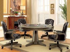 a round table with four chairs around it