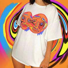 Our Trippy Psychedelic Melting Faces Festival Graphic T-Shirt An original hand drawn graphic design by Mikiko available on black and white! 👁 FREE WORLDWIDE SHIPPING 👁 Unisex t-shirts available in sizes  - Small - Medium - Large - XL - XXL (other sizes can be made upon request) - Ethically and sustainably manufactured - Artwork is professionally printed - no cracks or peeling - High quality heavy tee with a taped neck and sleeves - Authentic artwork - Machine wash inside out for best results ( Orange Rave Outfit, Blue Tees, Melting Face, Beige Tote Bag, Rave Outfit, Design Movements, Retro Streetwear, Black Graphic Tees, Black Baby