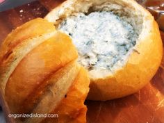 bread with blue cheese in it sitting on a cutting board