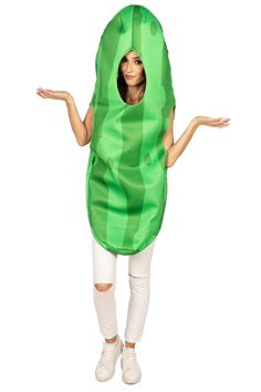 a woman in a green costume is standing with her hands out to the side and arms outstretched